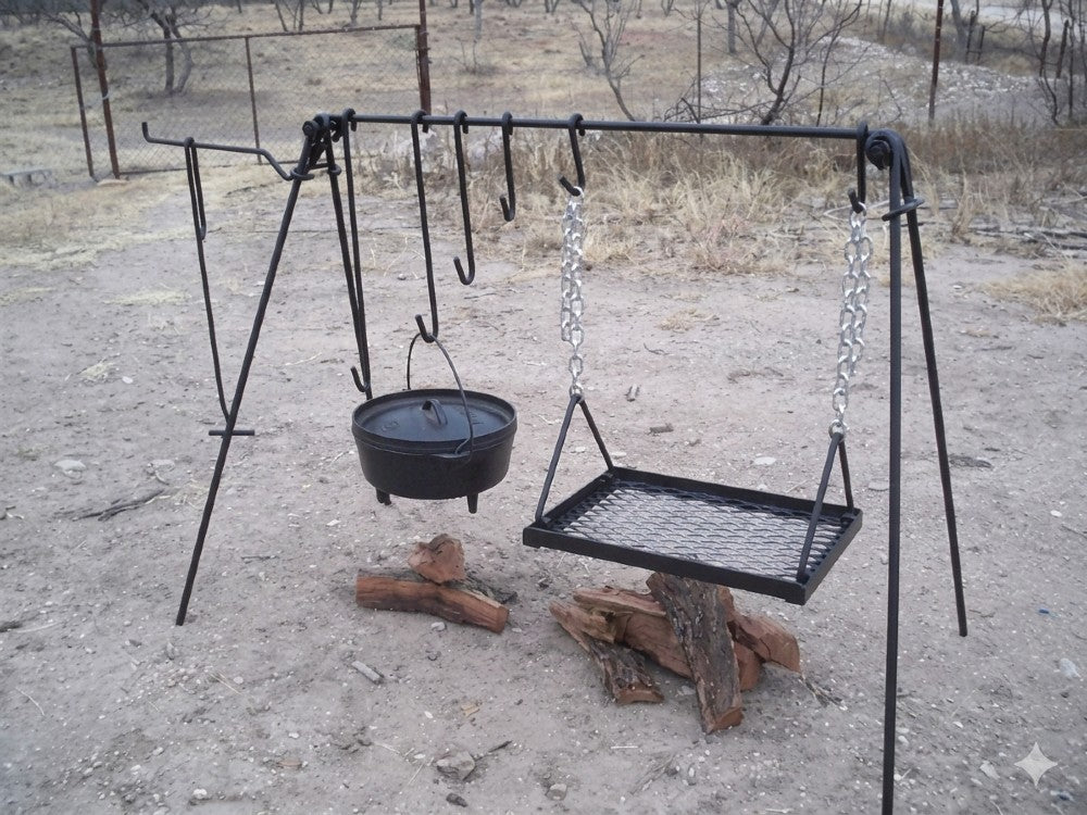 Front view of a portable quadpod campfire grill system designed for Dutch oven cooking and open-fire grilling.