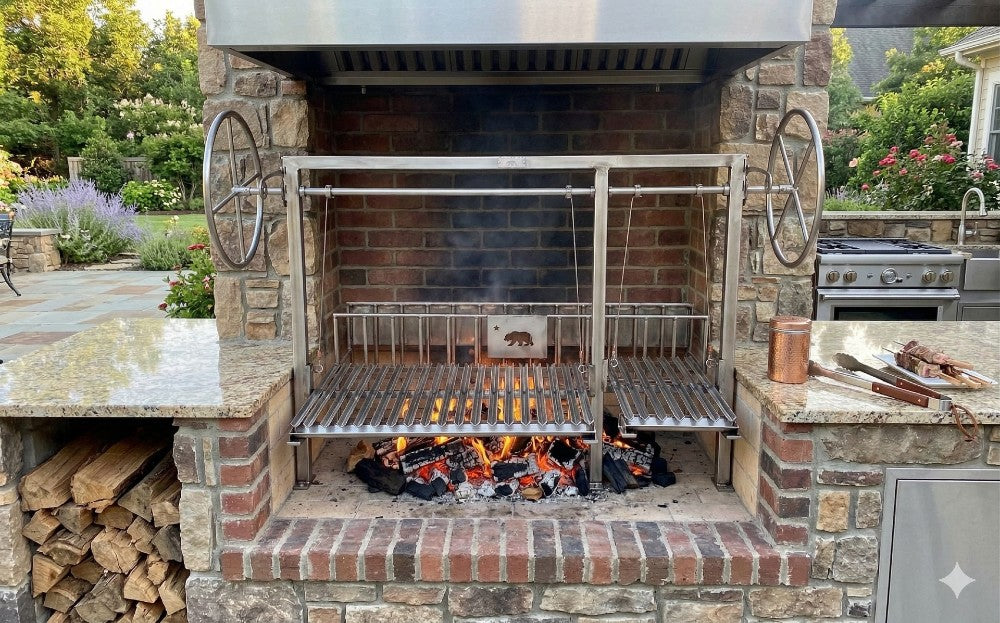 Stainless Split Argentine grill kit with dual adjustable grates and rear braseros installed in a brick masonry outdoor kitchen firebox.