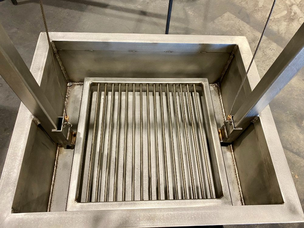 Close-up of Fully Welded Stainless Firebox with Round Rod Grate