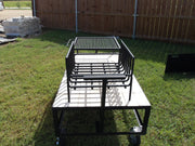 Exhibition Fire Table with All Terrain Casters, Small Asado Grill, Heavy Duty Large Brasero, and a Three-Sided Hinged Wind Block