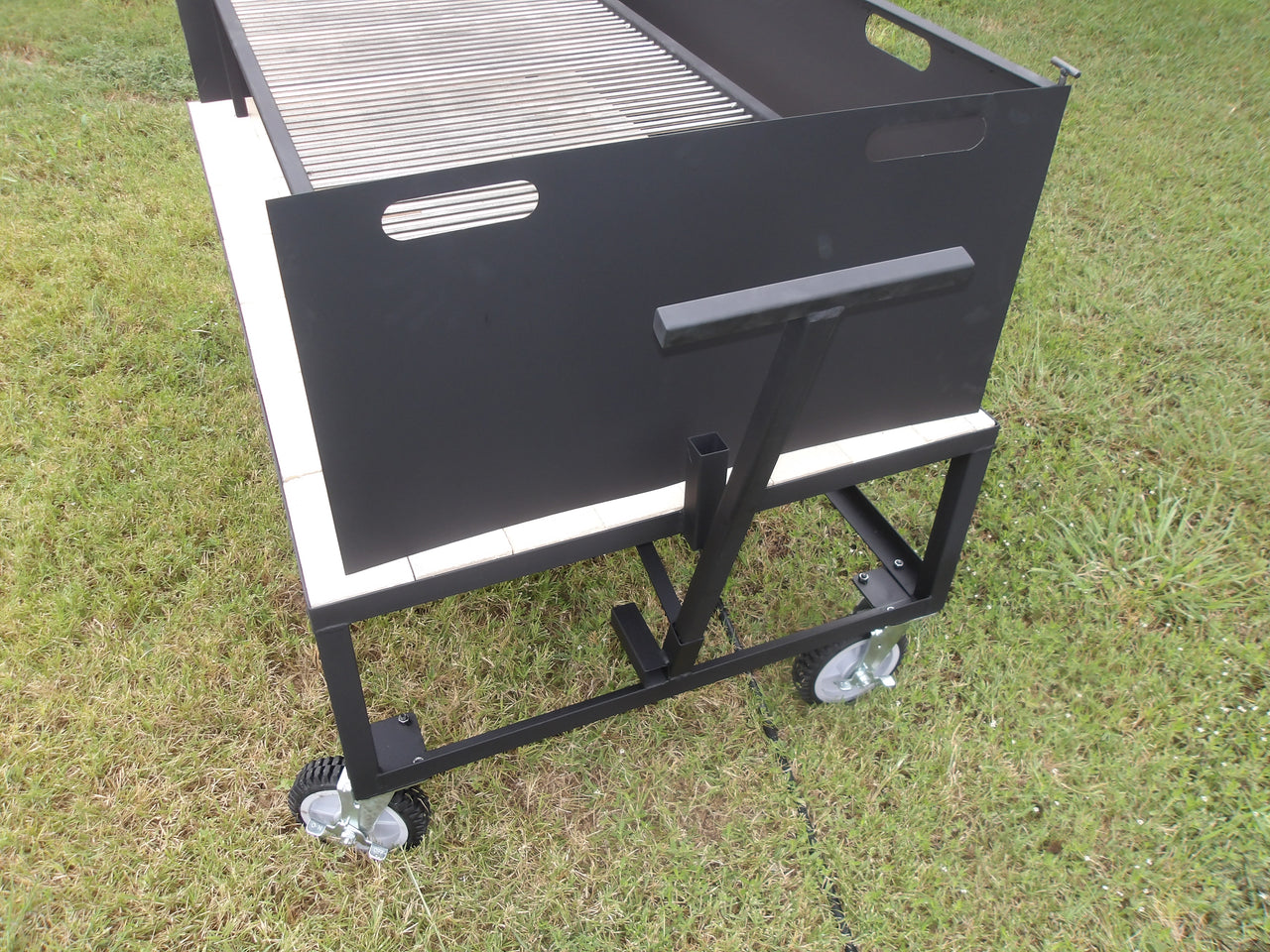 #0107 Exhibition Fire Table and Asado Grill with a Three-Sided Wind Block &amp; All Terrain Casters