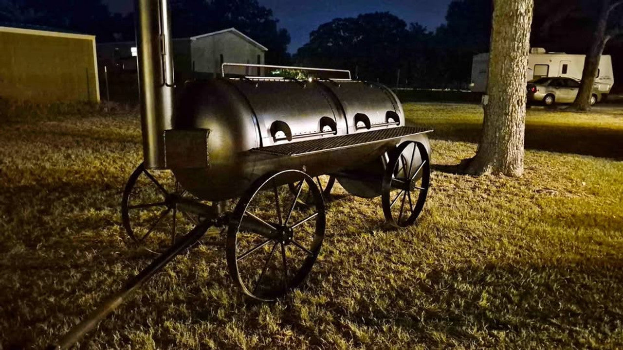 Heavy-duty 250 Gallon offset BBQ pit with wagon steering and smoke stack
