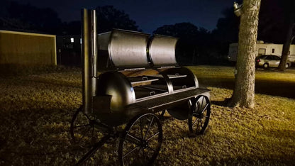 Texas-style offset smoker with dual lids and 4 pullout cooking trays open