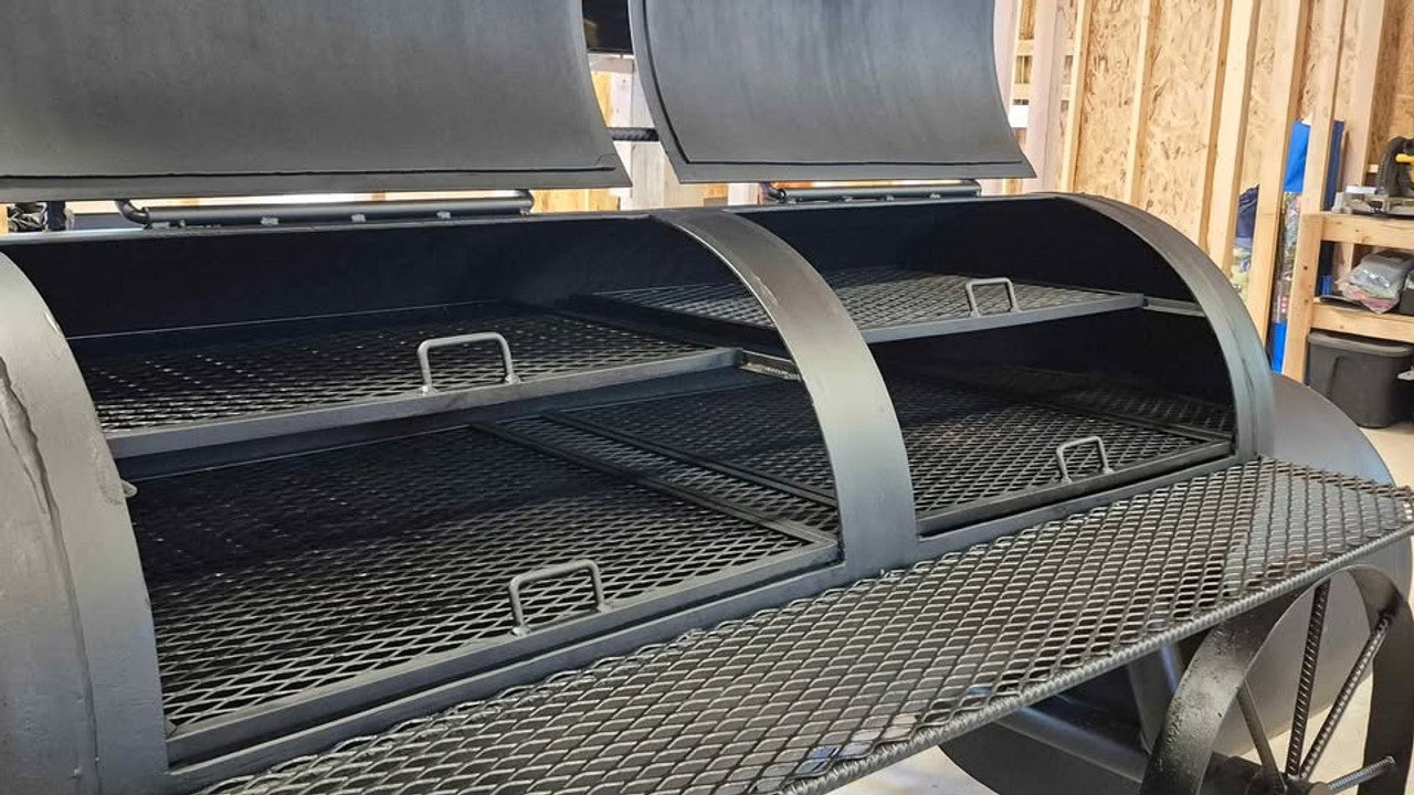 Texas-style offset smoker with dual lids and 4 pullout cooking trays open inside view