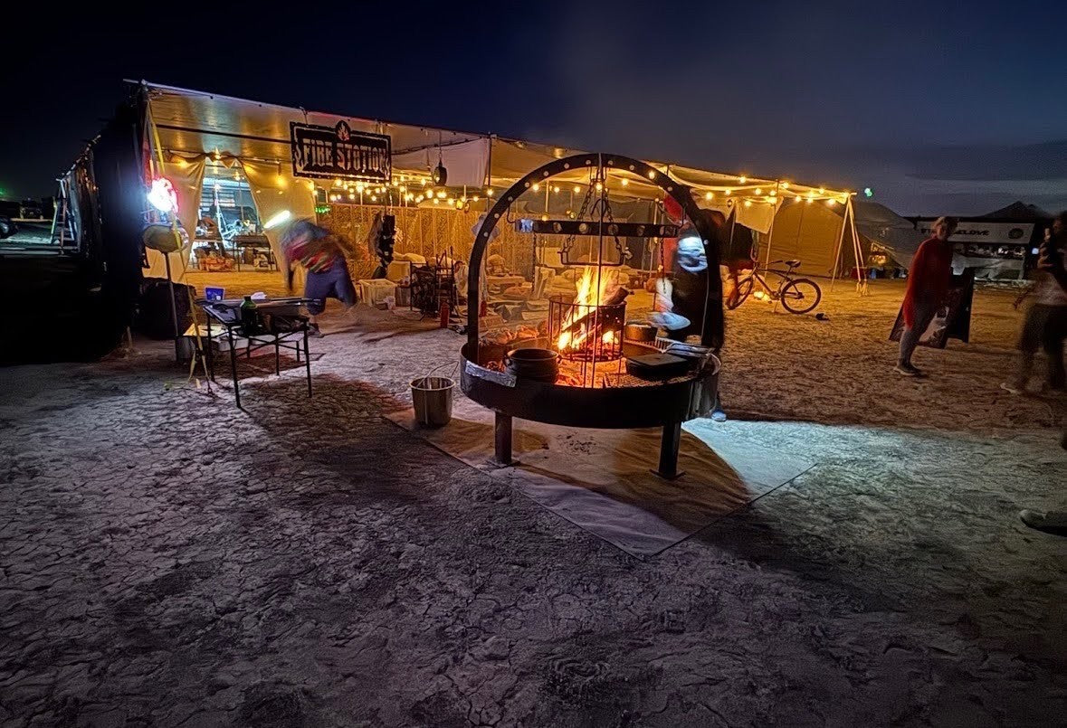 #5050 Round Catering Grill during center wood fire setup at Burning Man