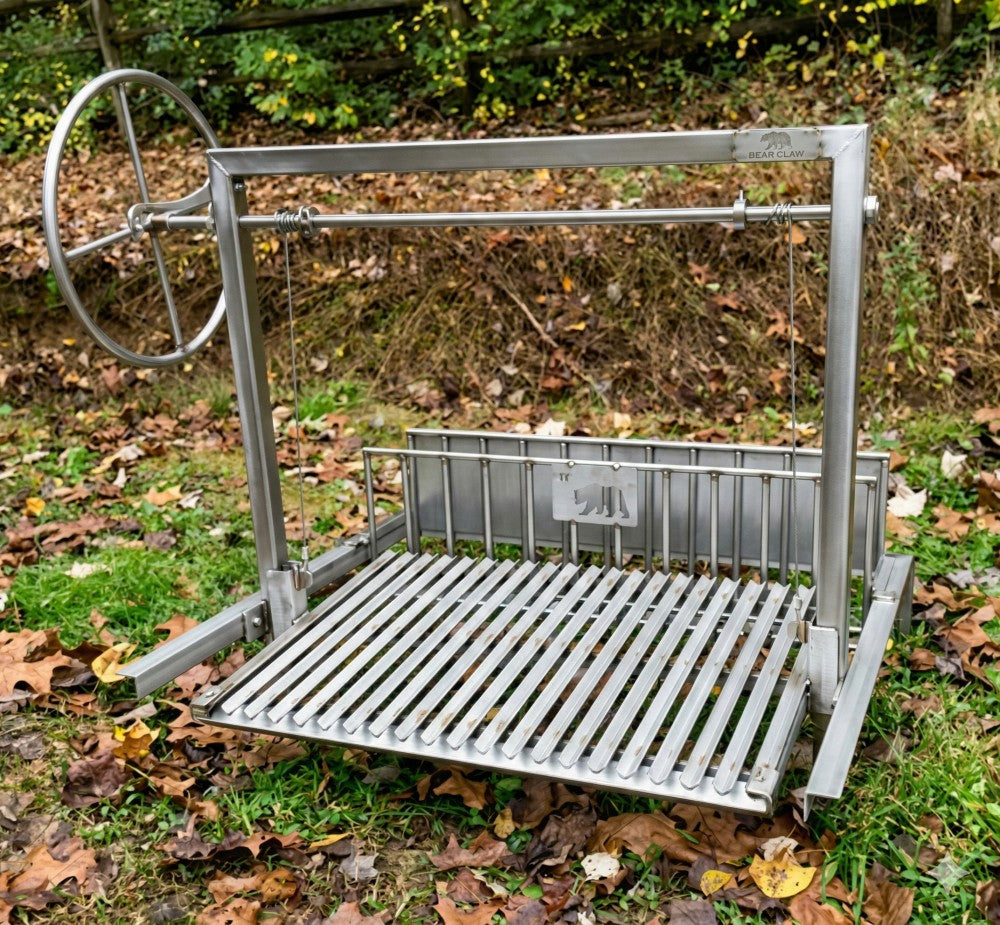 Stainless steel Argentine grill with rear brasero and V-grate, designed for open-front masonry fireboxes and live-fire wood or charcoal cooking.