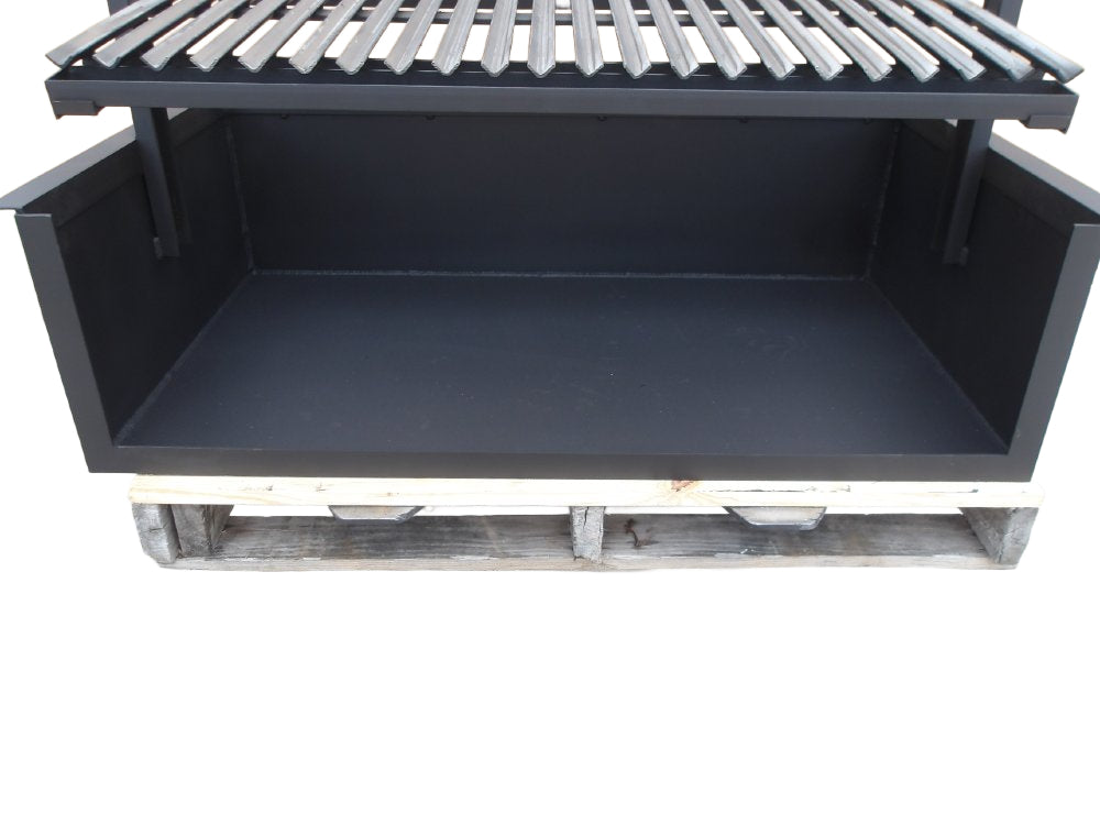 An Argentine built-in grill featuring a steel firebox, a V-grate with a drip pan, and a side wheel to adjust the height of the grill grate. 