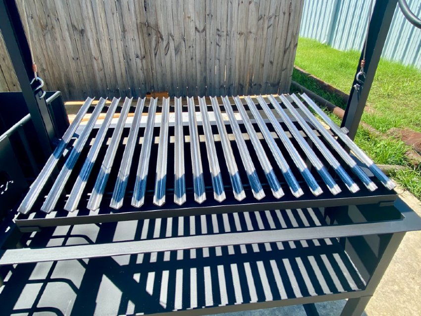 Portable Wood Fire and Charcoal  Argentine Grill with Ember Making Side Brasero, V-Grate with Drip Pan, and Adjustable Height Grill Grate