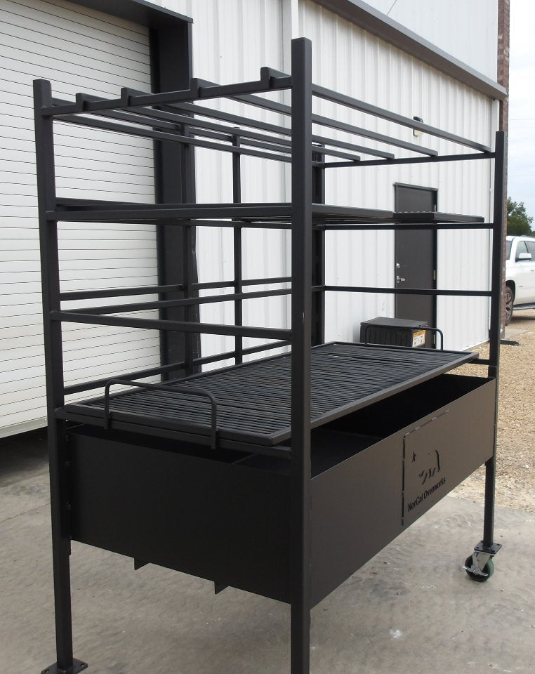 Side angle of Portico #4947 open-fire BBQ grill with multiple cooking levels and grilling surface.
