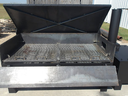 Large-capacity offset smoker with insulated firebox and smokestack for even heat and authentic wood-fired flavor, inside view