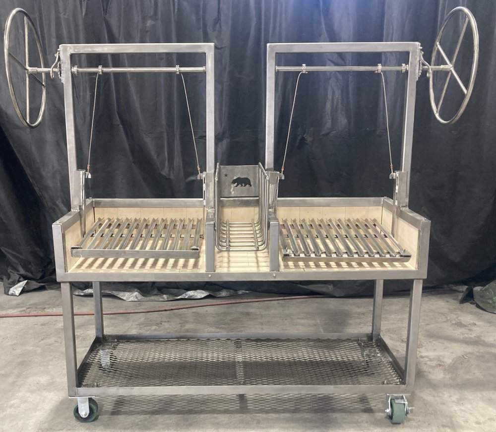 Model #4480 Portable Split Argentine Grill with Center Brasero, Dual Adjustable Grates, and Castered Legs shown in Black Steel with matching 3-piece Argentine Tool Set.