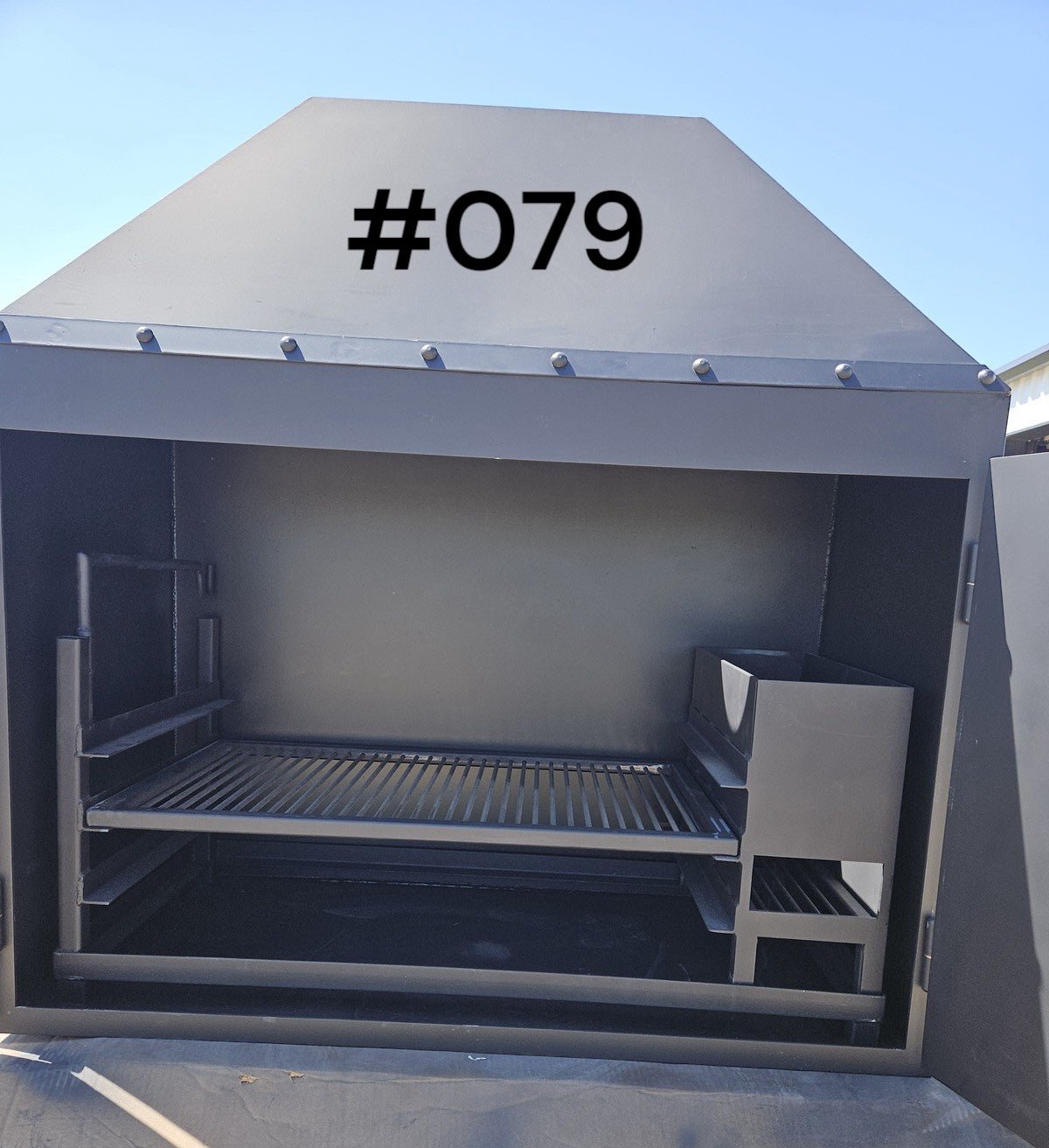 Fireplace With Doors and a BBQ Grill Insert - Heritage Backyard Inc.
