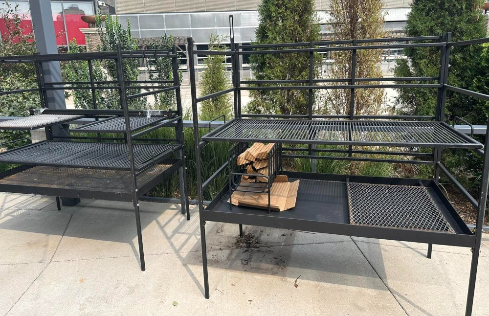Portico Open-Fire BBQ Grill with multi-level cooking grates for wood-fired outdoor cooking