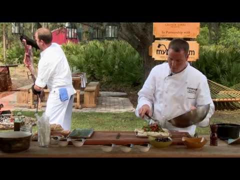 Chefs cooking on one of our Asado Grills in Orlando Fl