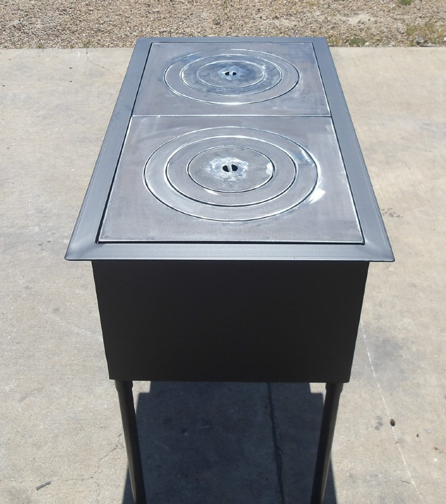 Top view of wood stove grill with two 16 inch fire ring plates showing removable rings for adjustable heat cooking