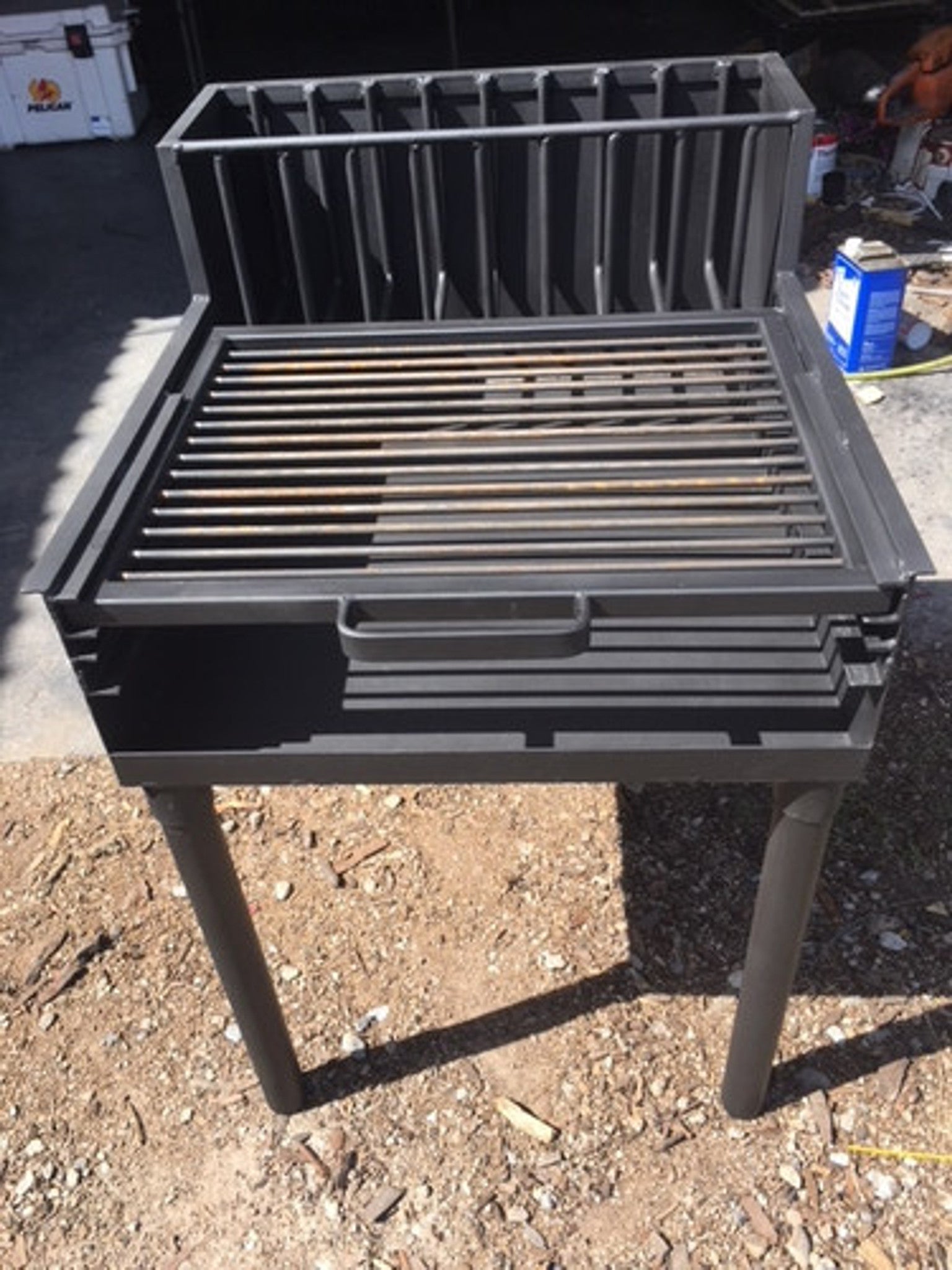 Charcoal grill with adjustable grate hotsell